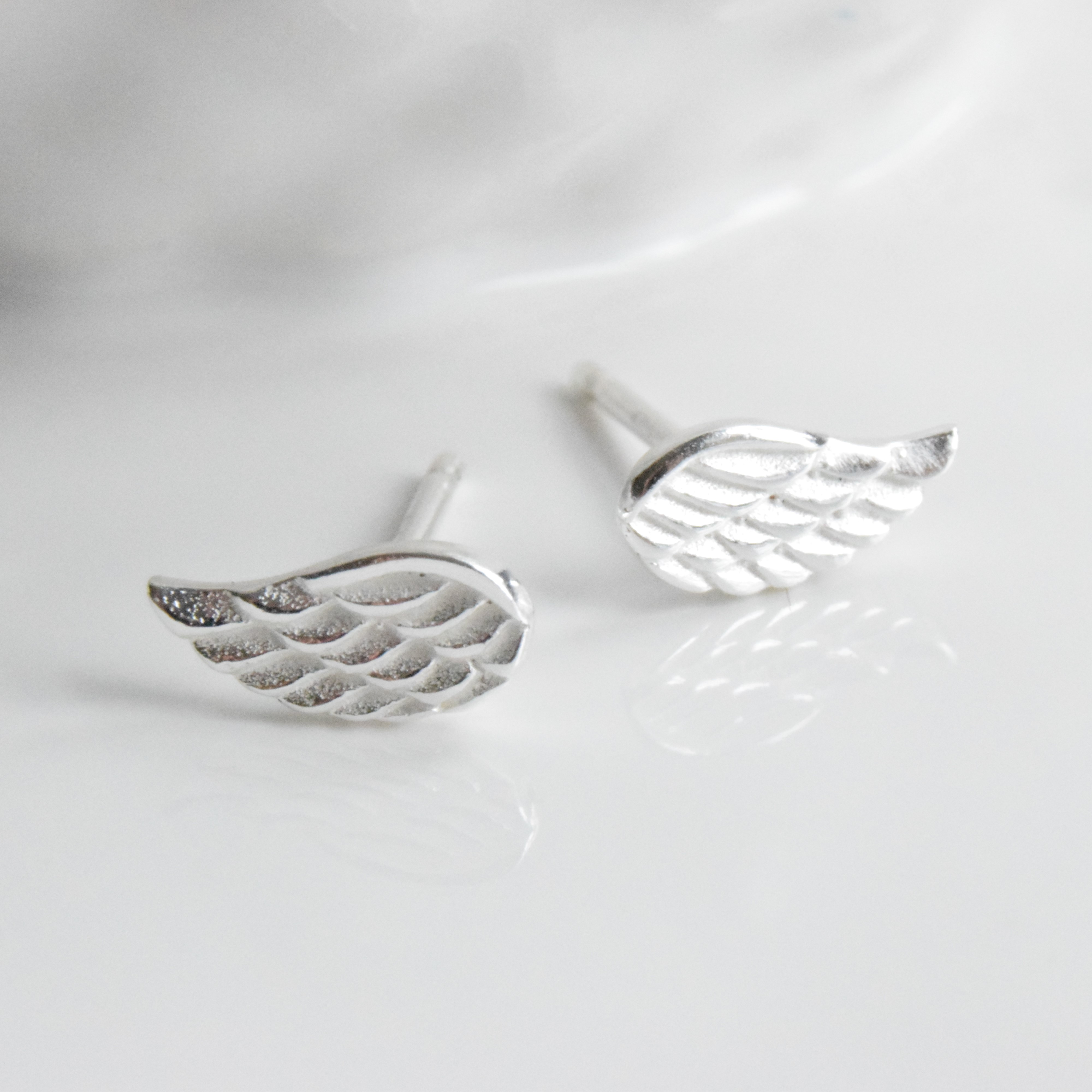 sterling silver angel wing earrings by yatris | notonthehighstreet.com